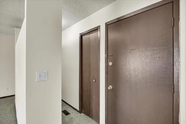 a view of bathroom with a washer and dryer