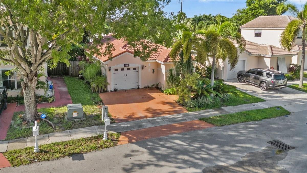 6344 Duval Drive Pompano Beach, FL 33063 - Photo 2 of 33 Photo 2