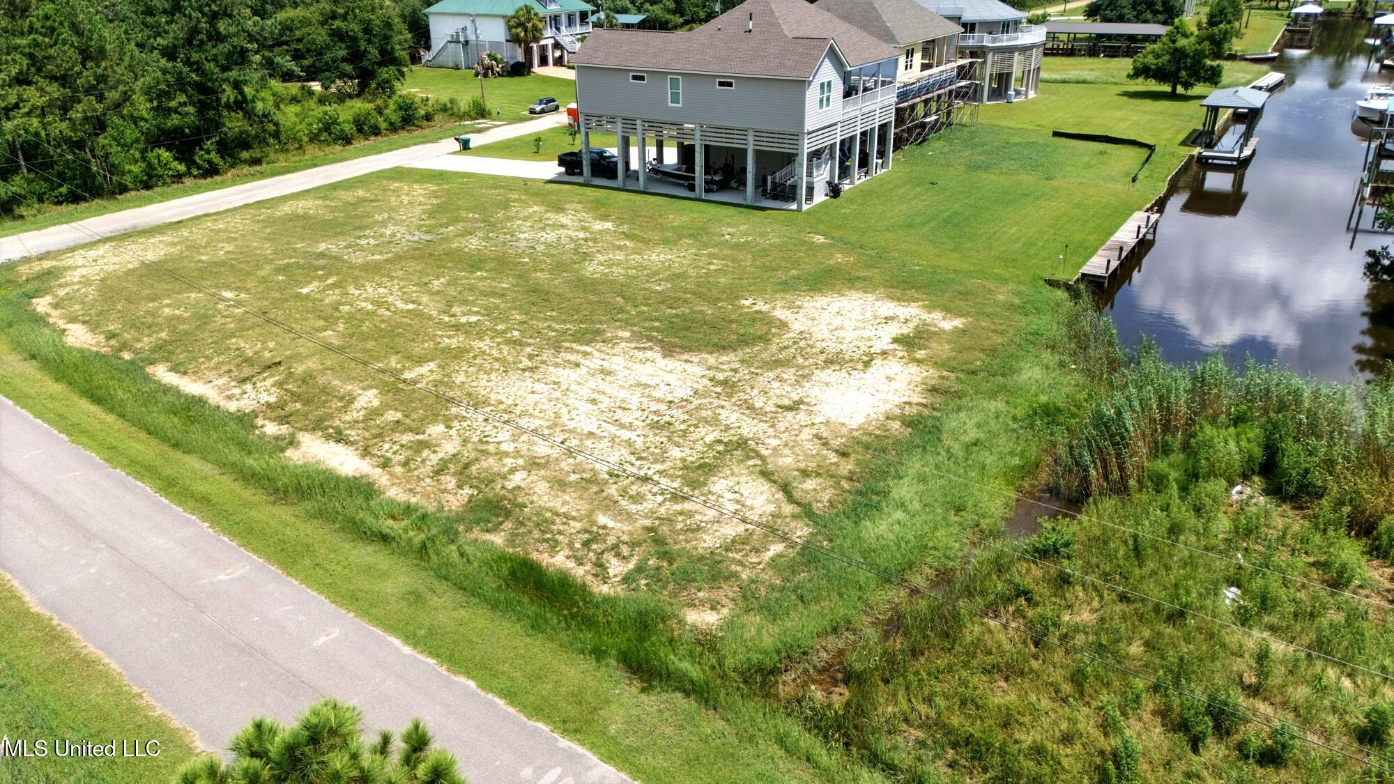 Nhn Enos Street Diamondhead, MS 39525 - Photo 16 of 26 dji_20250715005546_0122_d