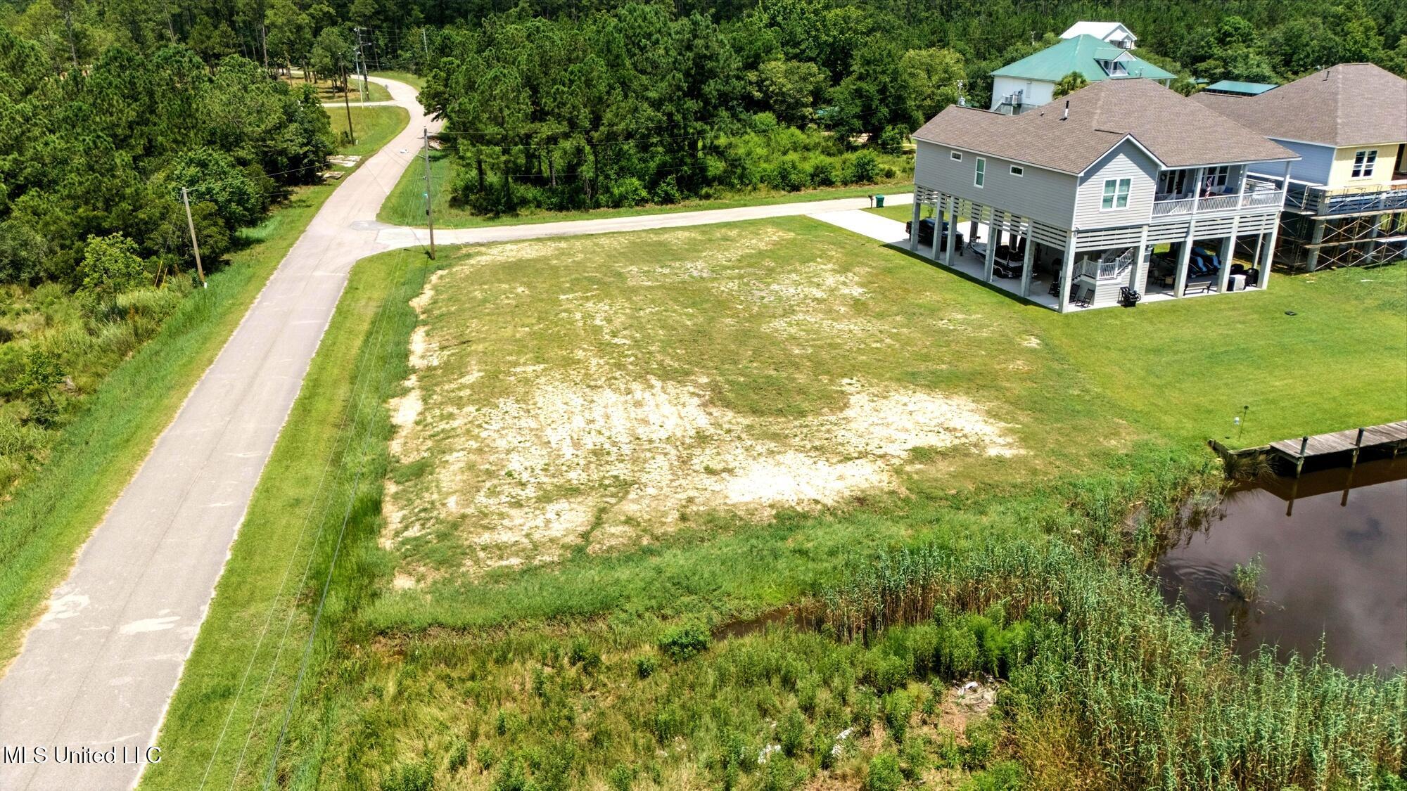 Nhn Enos Street Diamondhead, MS 39525 - Photo 22 of 26 dji_20250715005432_0107_d