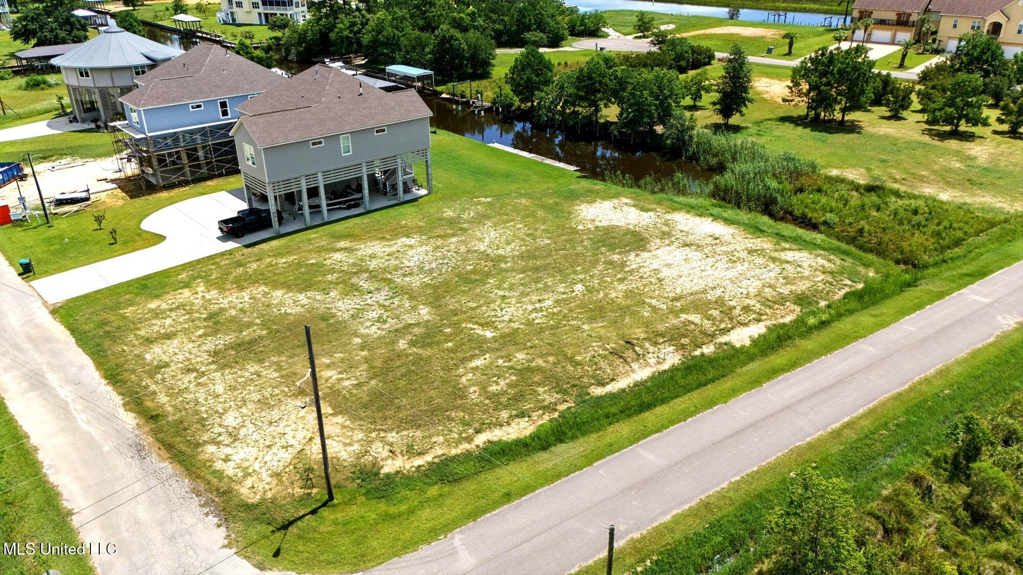 Nhn Enos Street Diamondhead, MS 39525 - Photo 5 of 26 dji_20250715005603_0125_d