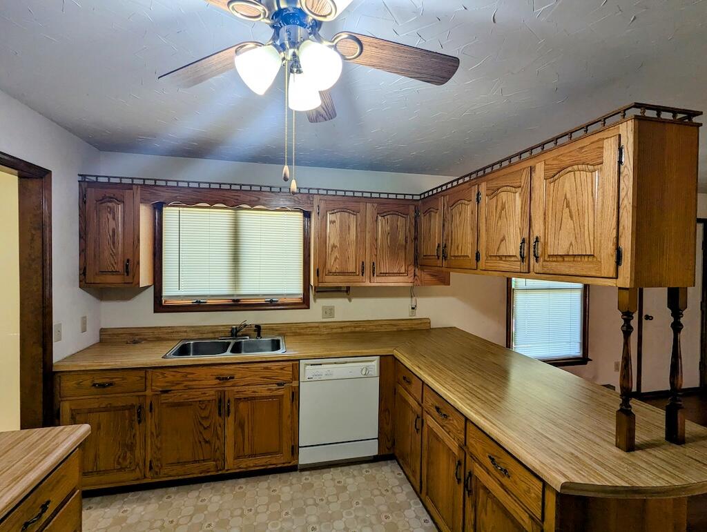 1518 Penn Road Northwest Floyd, VA 24091 - Photo 8 of 27 a kitchen with a sink appliances cabinets and a large window