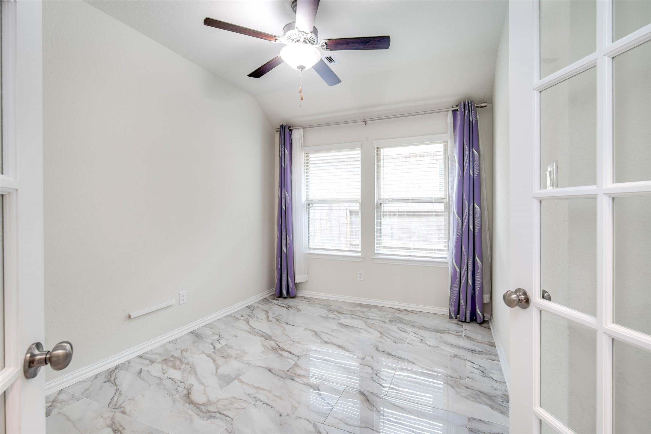 24239 Gold Cheyenne Way Katy, TX 77493 - Photo 11 of 38 a view of a livingroom with a ceiling fan and window