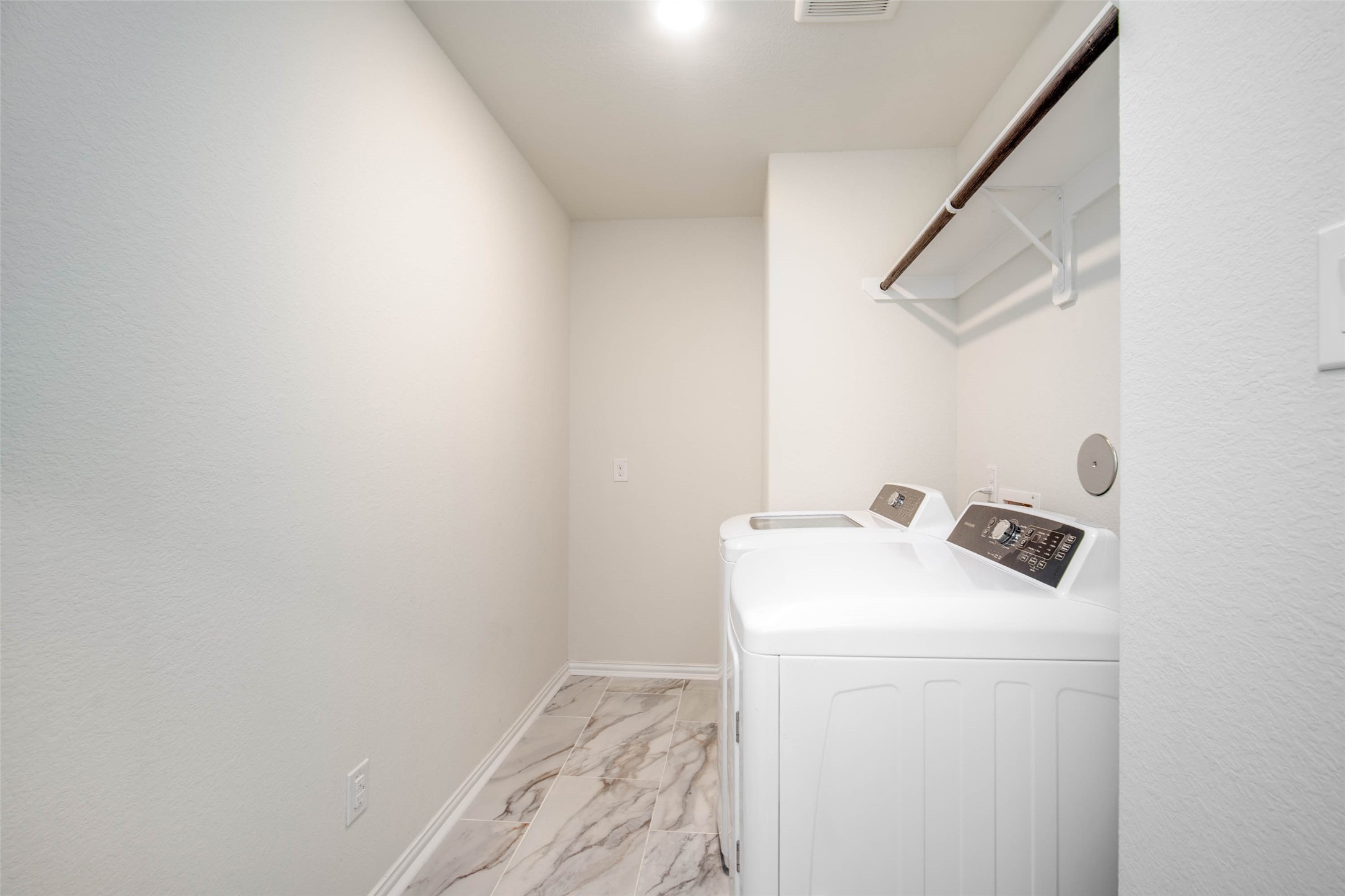 24239 Gold Cheyenne Way Katy, TX 77493 - Photo 12 of 38 a utility room with dryer and washer