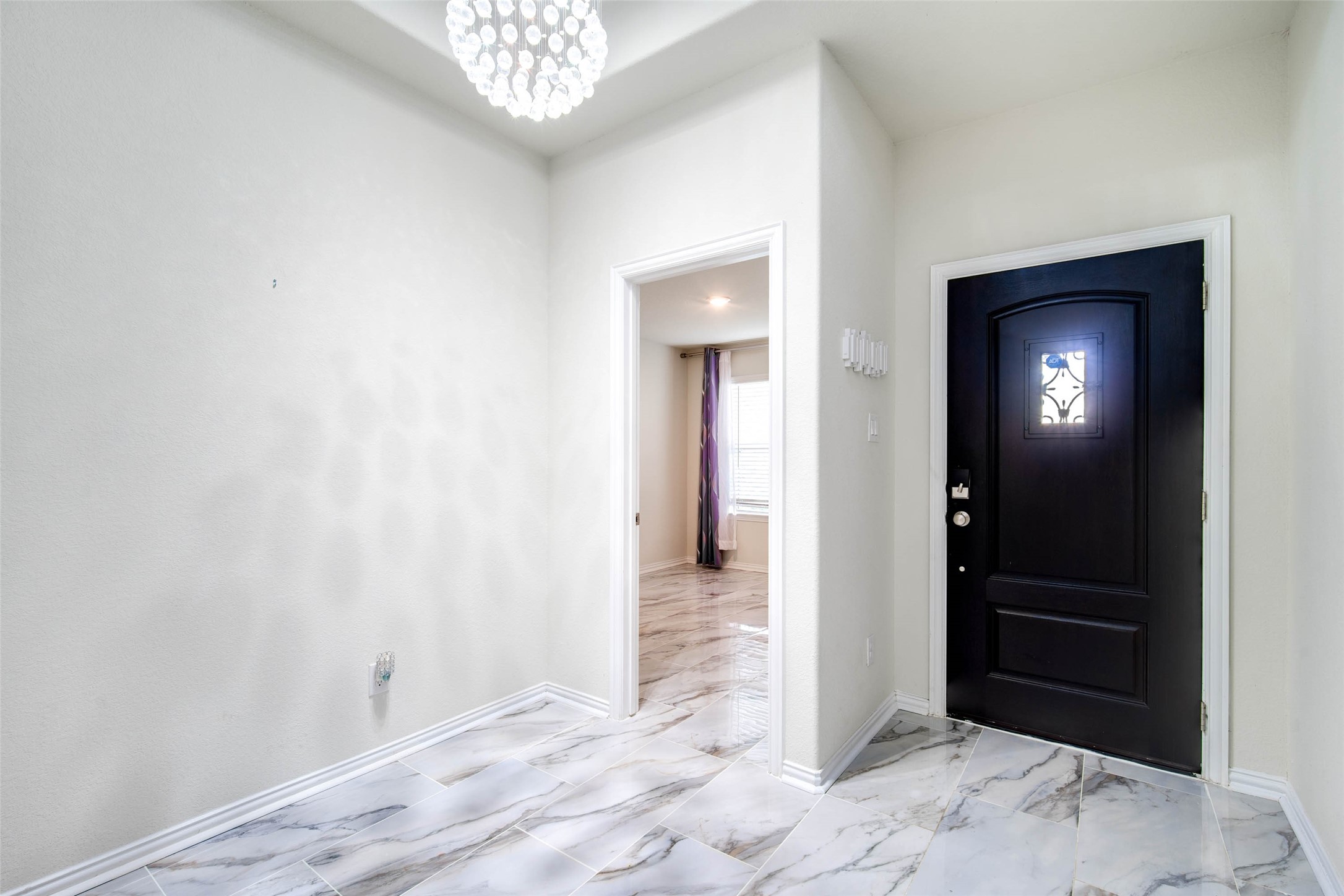 24239 Gold Cheyenne Way Katy, TX 77493 - Photo 6 of 38 a view of a hallway with a elevator