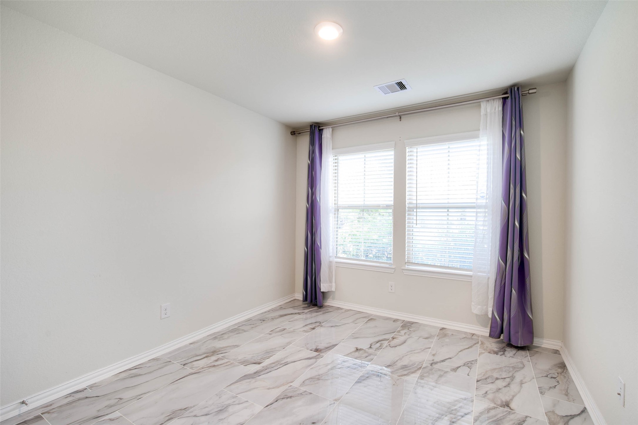 24239 Gold Cheyenne Way Katy, TX 77493 - Photo 7 of 38 an empty room with a window