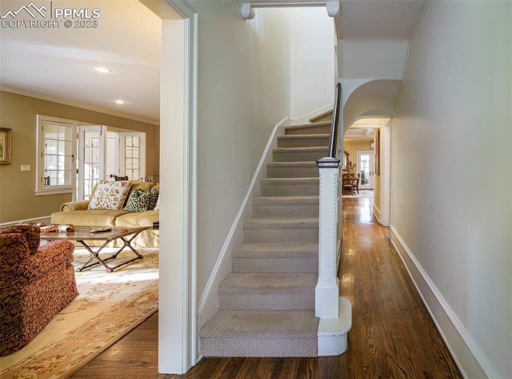 7 5th Street Colorado Springs, CO 80906 - Photo 21 of 46 a view of entryway and hall with wooden floor