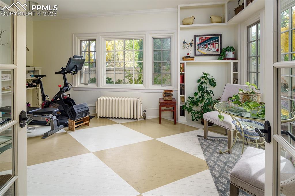 7 5th Street Colorado Springs, CO 80906 - Photo 7 of 46 a room with furniture and a large window