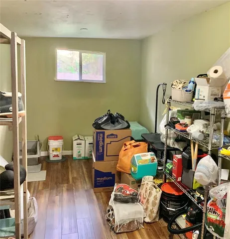 a room with toys and wooden floor