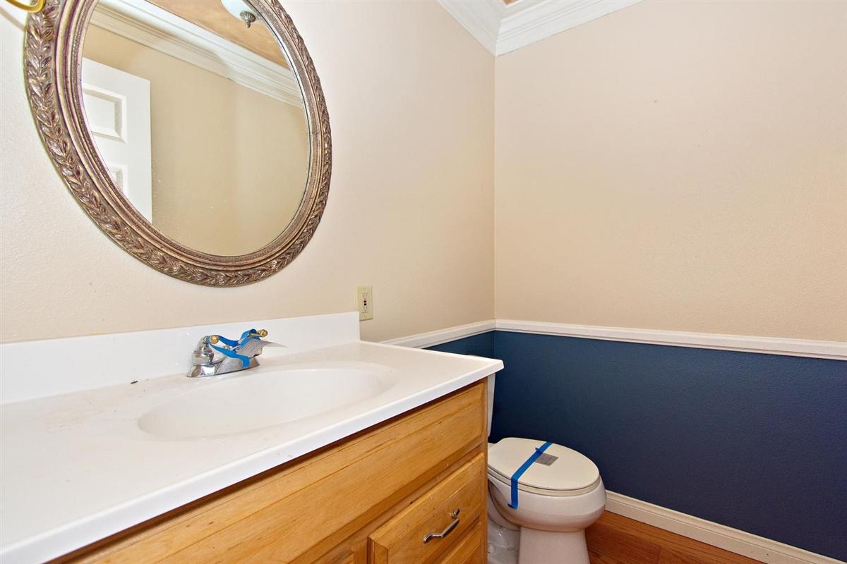 59911 Hop Patch Spring Road Mountain Center, CA 92561 - Photo 14 of 42 a bathroom with a sink a toilet and a mirror