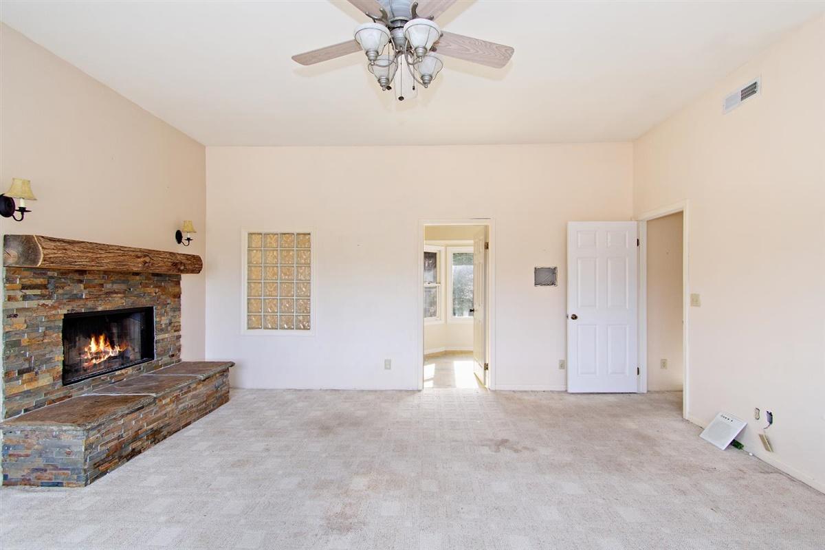 59911 Hop Patch Spring Road Mountain Center, CA 92561 - Photo 16 of 42 a view of livingroom with fireplace
