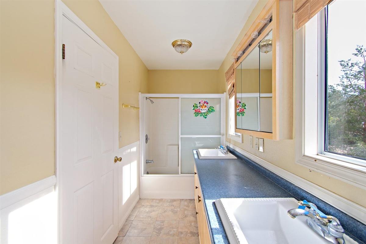 59911 Hop Patch Spring Road Mountain Center, CA 92561 - Photo 21 of 42 a view of kitchen and hall with a window