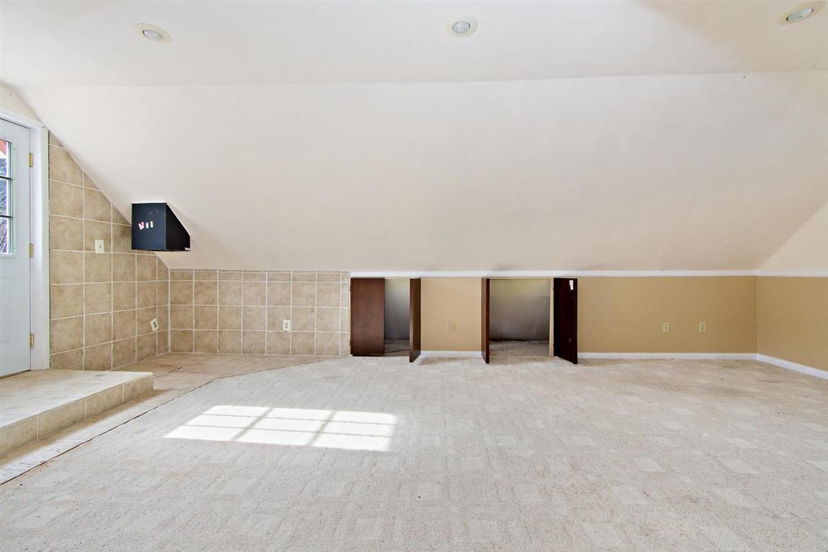 59911 Hop Patch Spring Road Mountain Center, CA 92561 - Photo 22 of 42 a view of an empty room with a window