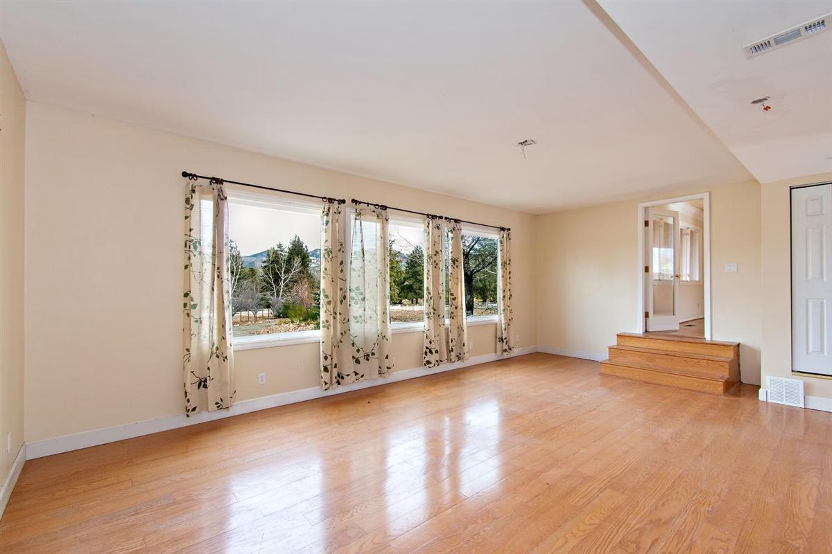 59911 Hop Patch Spring Road Mountain Center, CA 92561 - Photo 4 of 42 a view of an empty room with a window