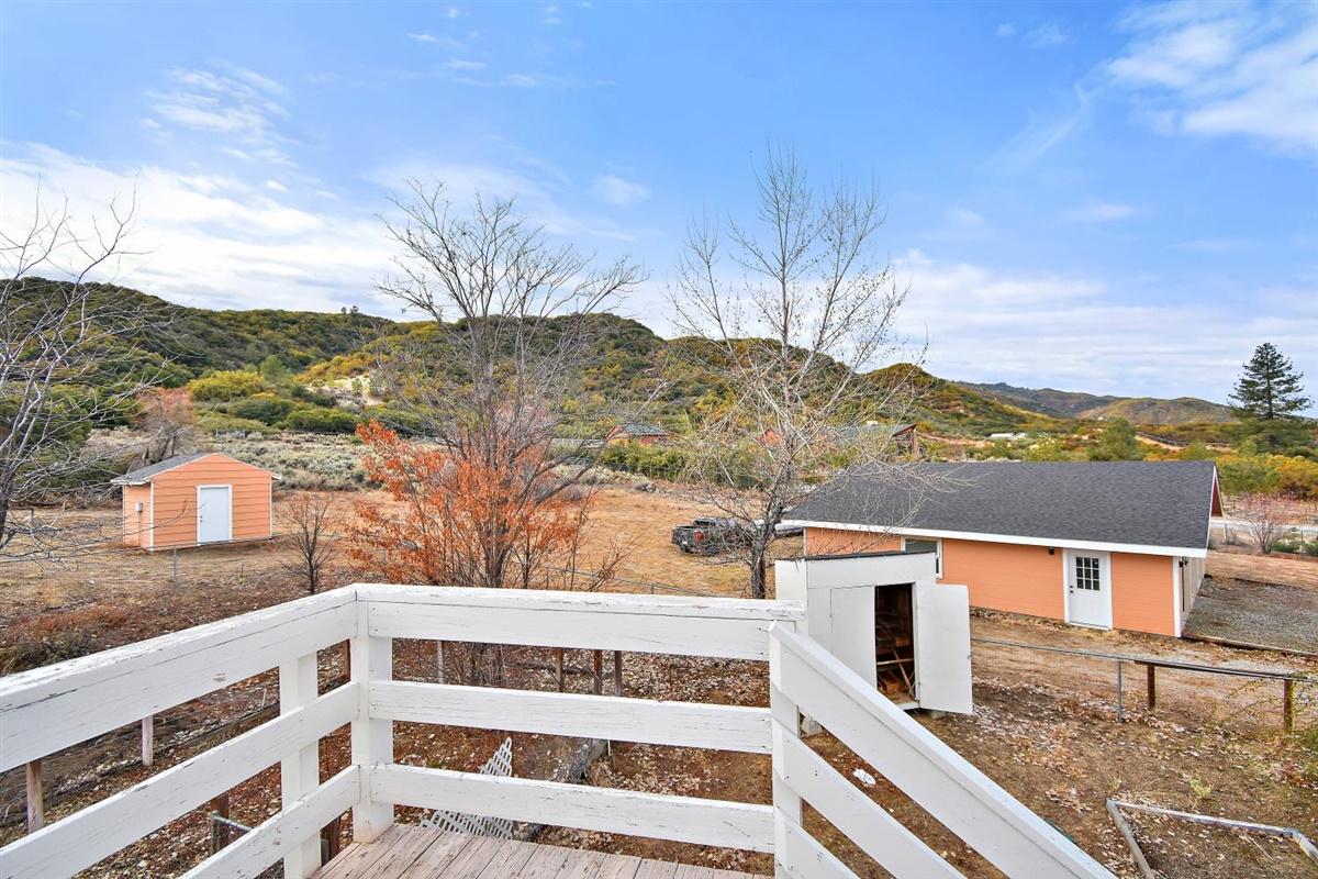 59911 Hop Patch Spring Road Mountain Center, CA 92561 - Photo 36 of 42 a view of building with mountain
