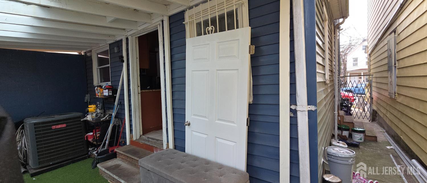 136 Smith Street Elizabeth, NJ 07201 - Photo 16 of 36 a view of walk in closet