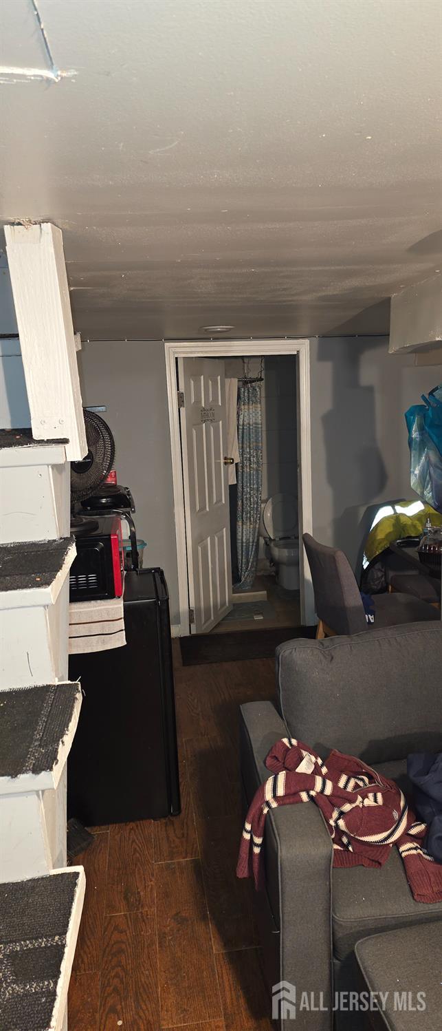 136 Smith Street Elizabeth, NJ 07201 - Photo 25 of 36 a bedroom with furniture and natural light