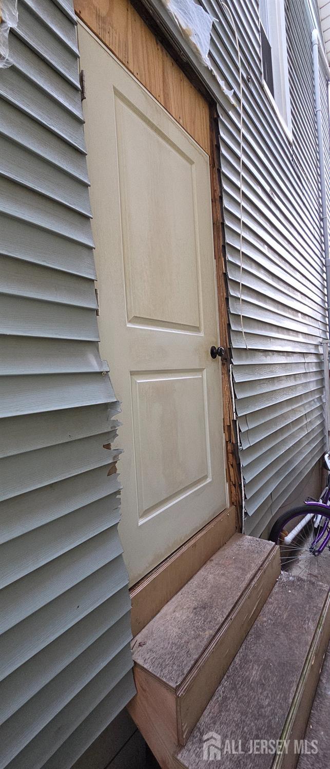136 Smith Street Elizabeth, NJ 07201 - Photo 30 of 36 a view of a house with a door