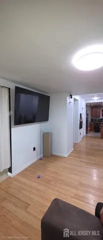 a view of a livingroom with a furniture