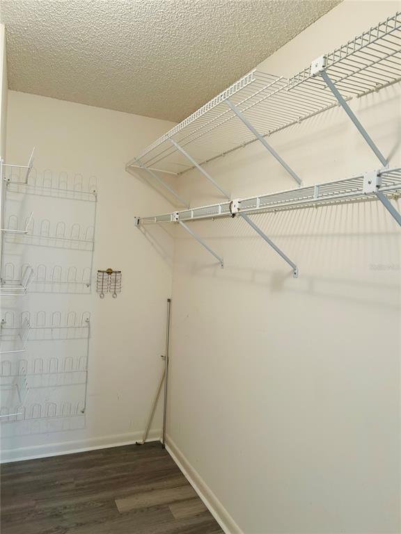 8530 Southwest 90th Street, Unit B Ocala, FL 34481 - Photo 27 of 45 a view of a room with wooden floor