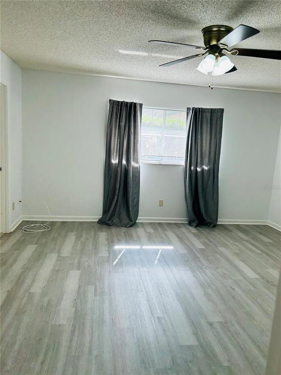 8530 Southwest 90th Street, Unit B Ocala, FL 34481 - Photo 29 of 45 a view of an empty room with a window