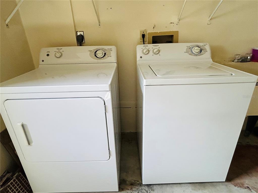 8530 Southwest 90th Street, Unit B Ocala, FL 34481 - Photo 40 of 45 a utility room with dryer and washer