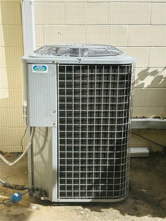 8530 Southwest 90th Street, Unit B Ocala, FL 34481 - Photo 41 of 45 a view of a door with a bench