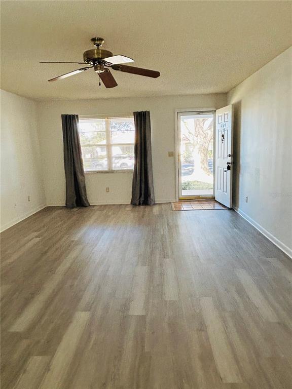 8530 Southwest 90th Street, Unit B Ocala, FL 34481 - Photo 6 of 45 a view of an empty room with a window