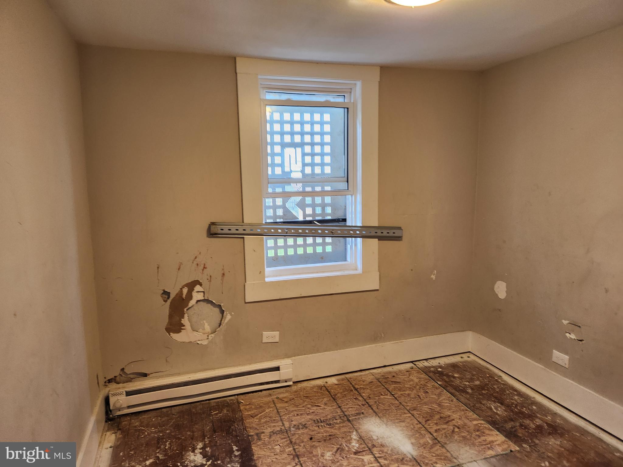 113 Eastern Boulevard Essex, MD 21221 - Photo 16 of 19 a view of a livingroom with a window
