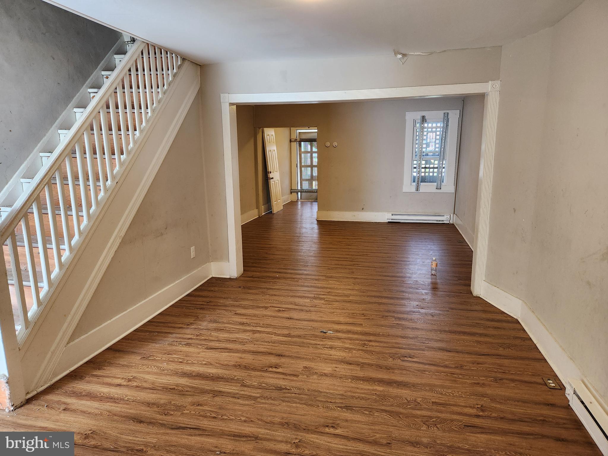 113 Eastern Boulevard Essex, MD 21221 - Photo 4 of 19 a view of an entryway with wooden floor