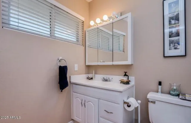 a kitchen with a sink cabinets and appliances