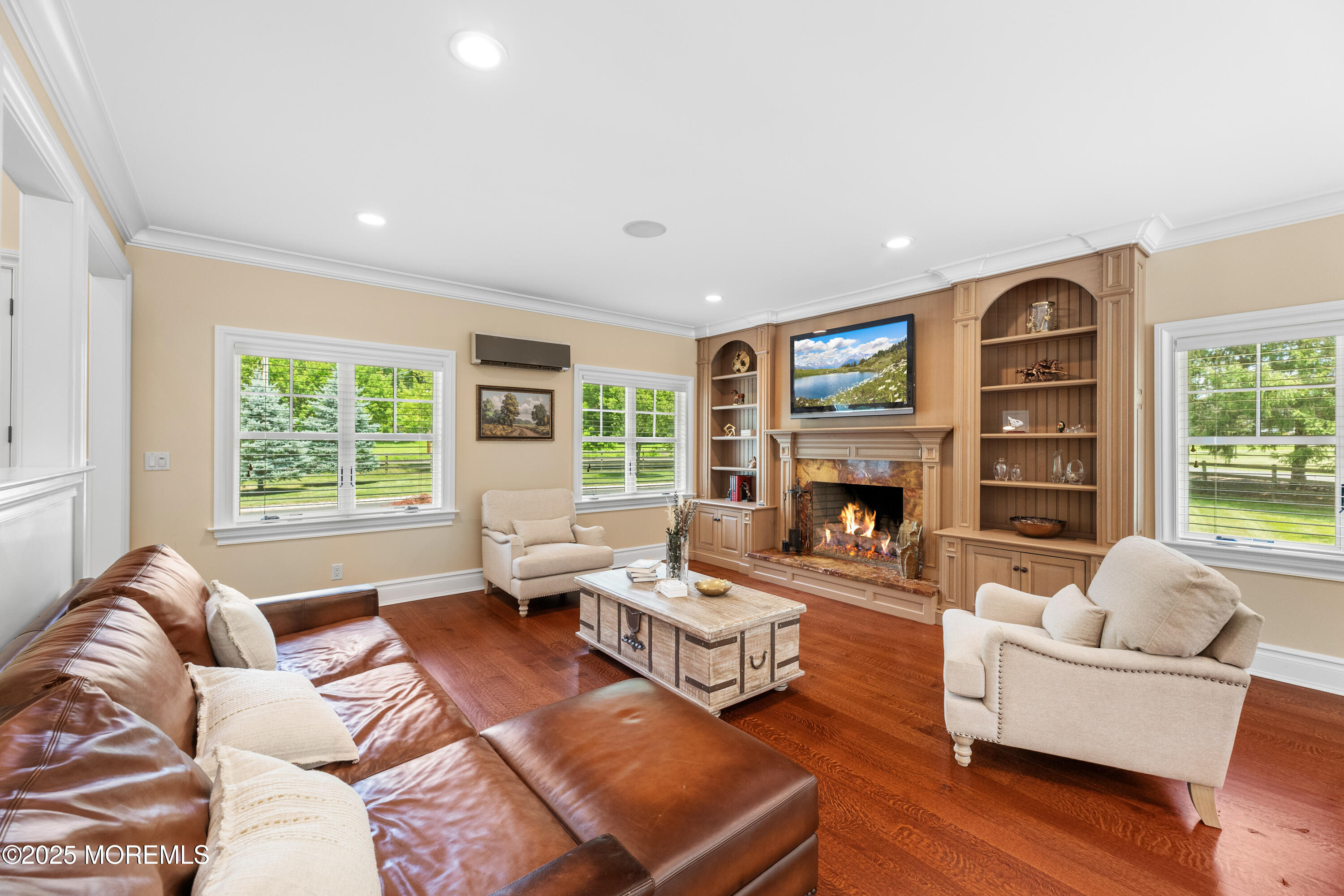 13 Indian Path Millstone Township, NJ 08535 - Photo 11 of 67 a living room with furniture large window and fireplace