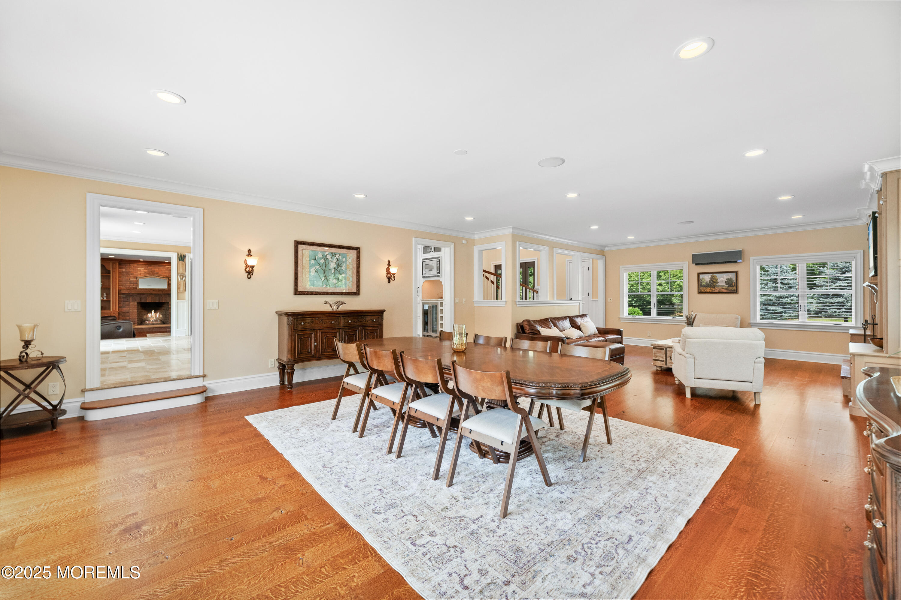 13 Indian Path Millstone Township, NJ 08535 - Photo 12 of 67 a living room with lots of furniture and wooden floor