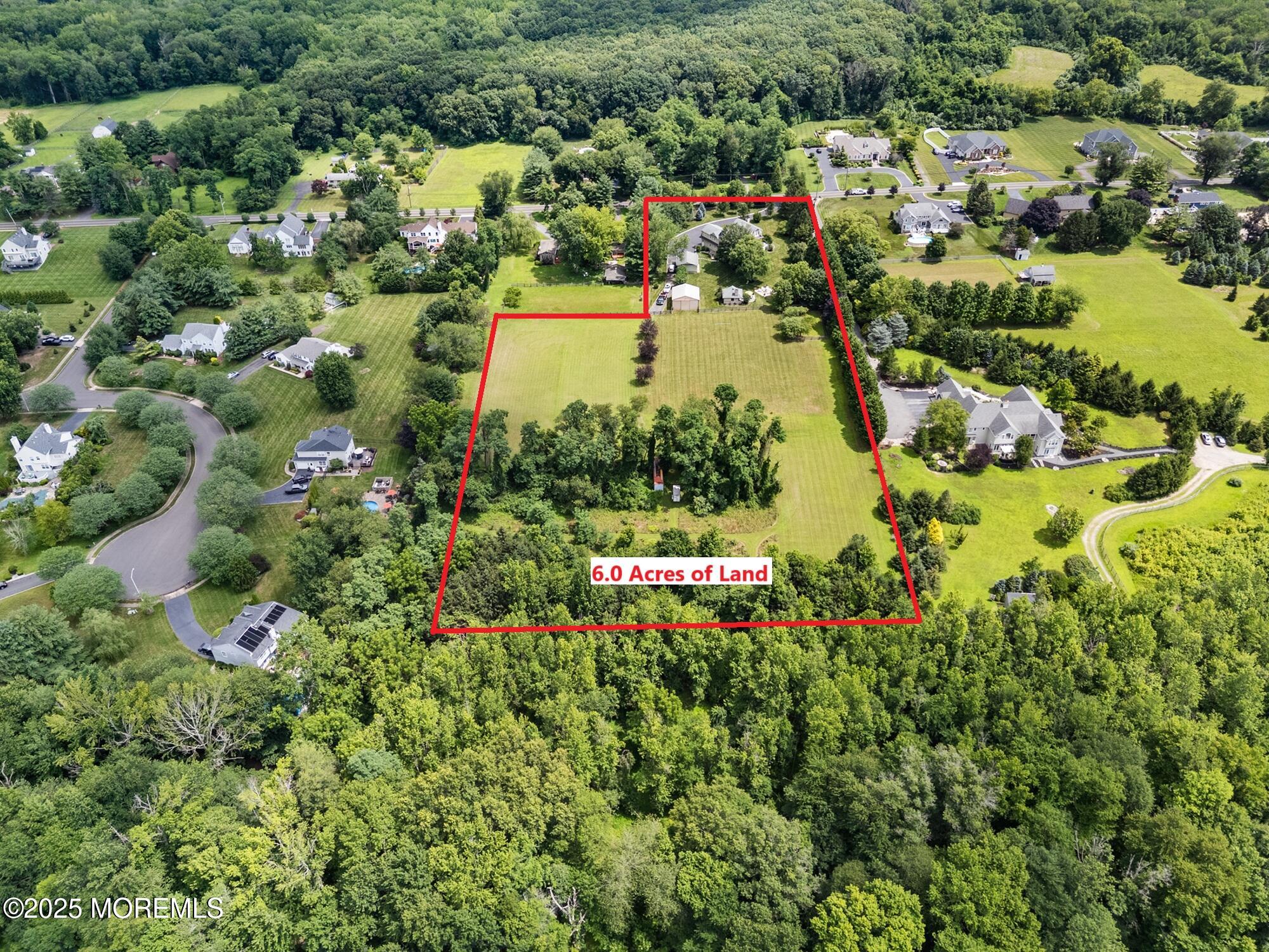 13 Indian Path Millstone Township, NJ 08535 - Photo 2 of 67 an aerial view of residential houses with outdoor space and trees all around