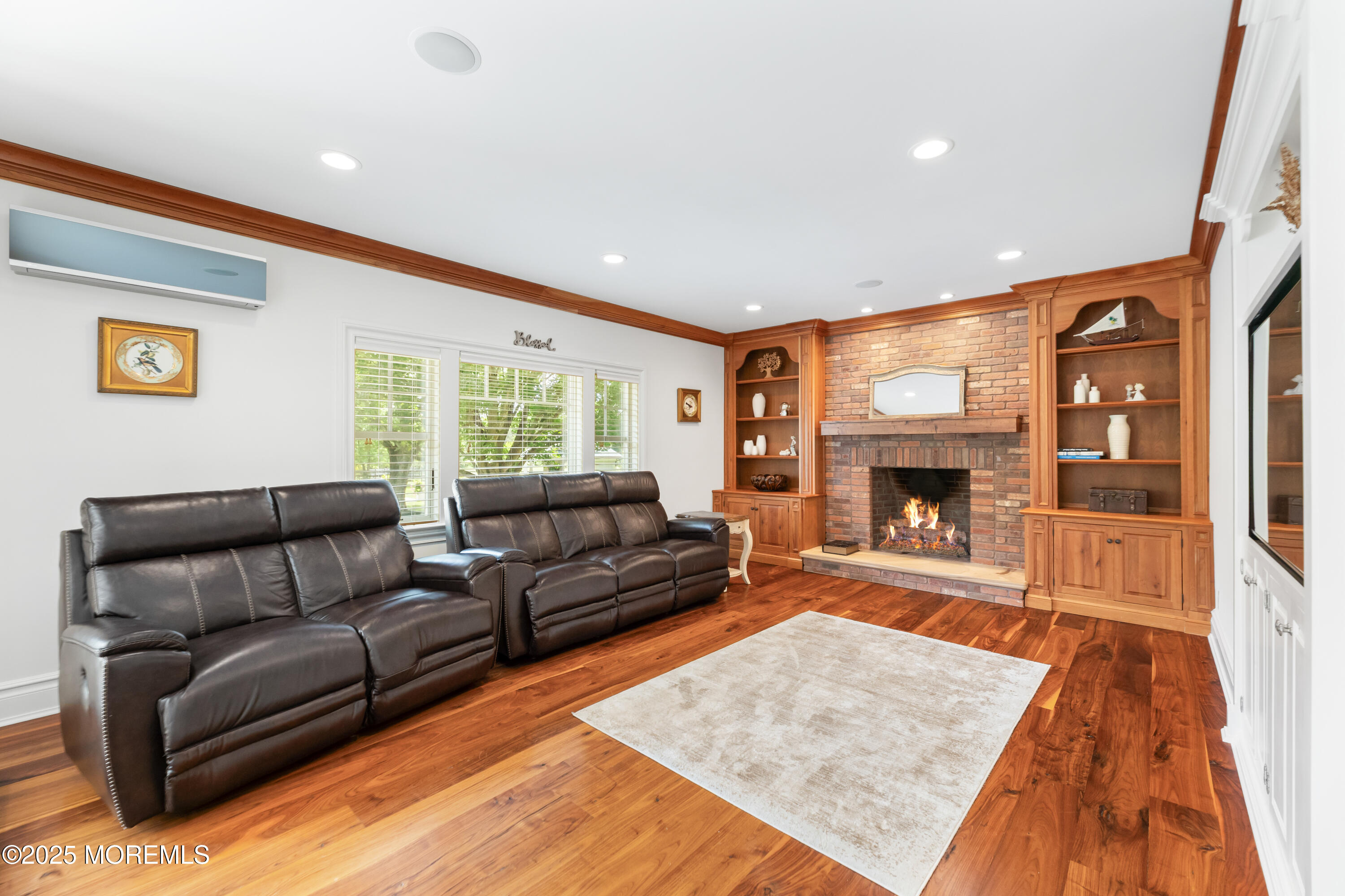 13 Indian Path Millstone Township, NJ 08535 - Photo 21 of 67 a living room with furniture and a fireplace