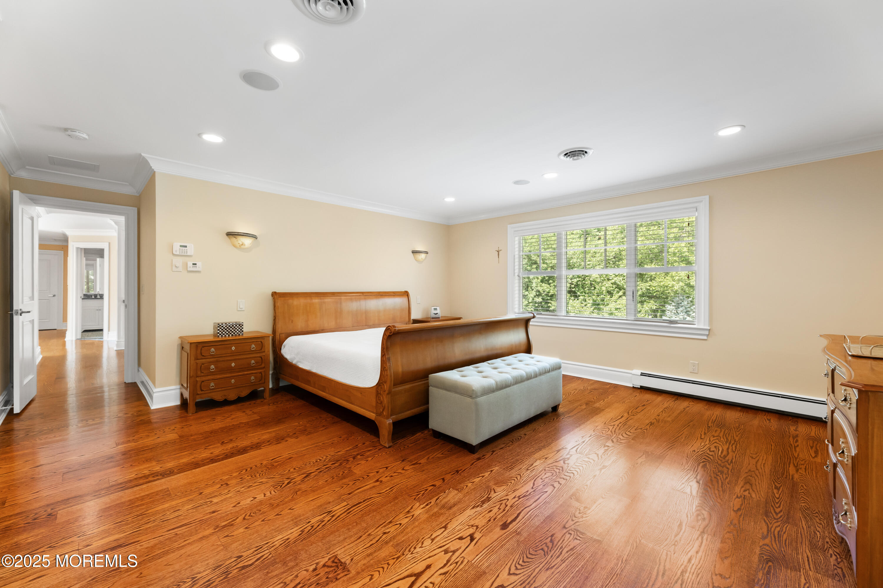 13 Indian Path Millstone Township, NJ 08535 - Photo 31 of 67 a spacious bedroom with a bed and a couch