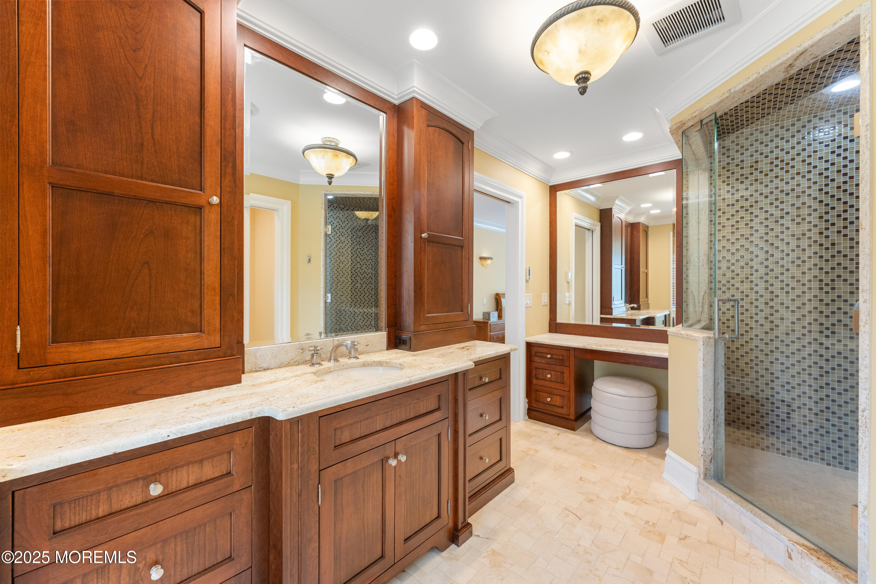 13 Indian Path Millstone Township, NJ 08535 - Photo 33 of 67 a spacious bathroom with a double vanity sink a large mirror and a bathtub