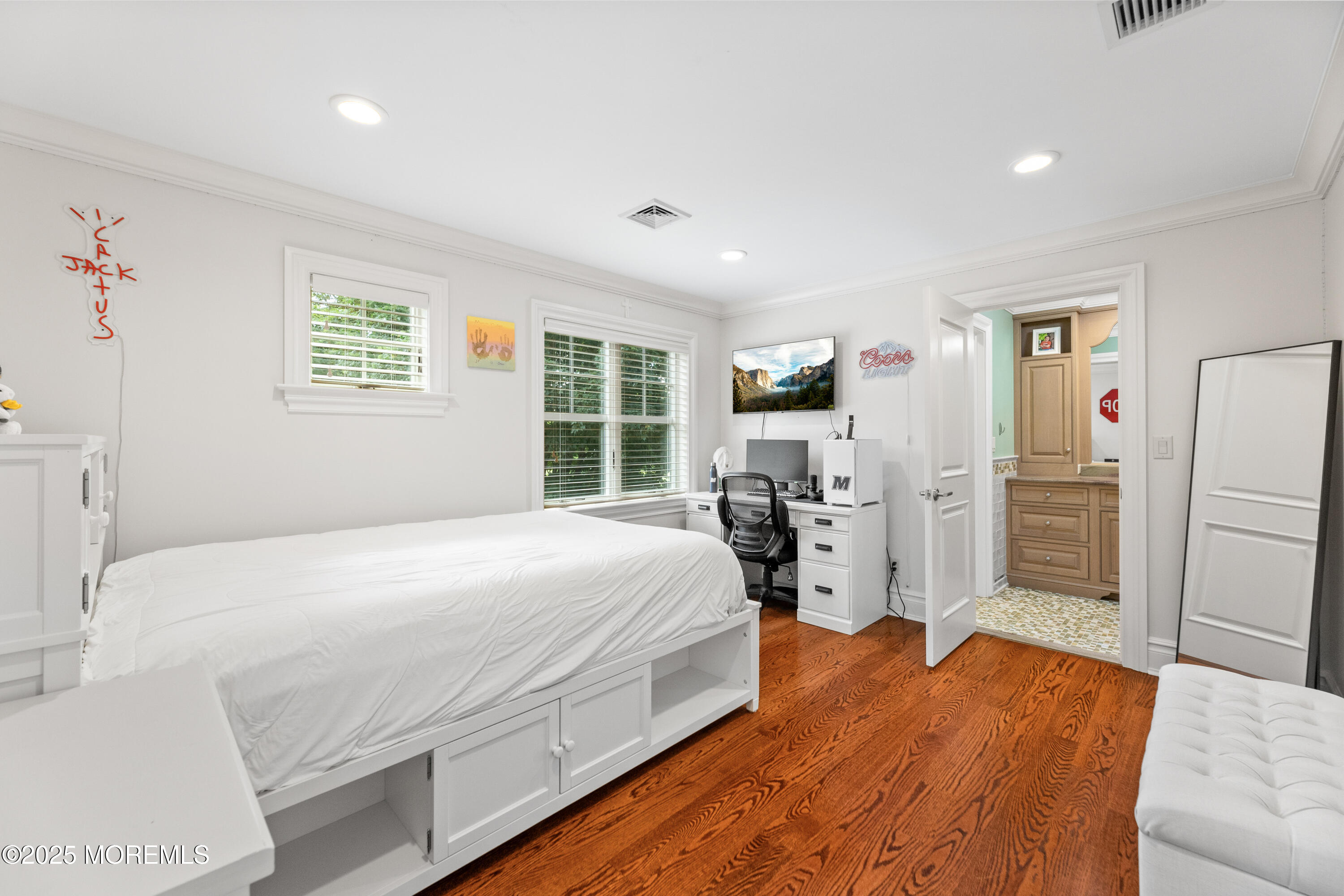 13 Indian Path Millstone Township, NJ 08535 - Photo 42 of 67 a bedroom with a bed dresser and a large window