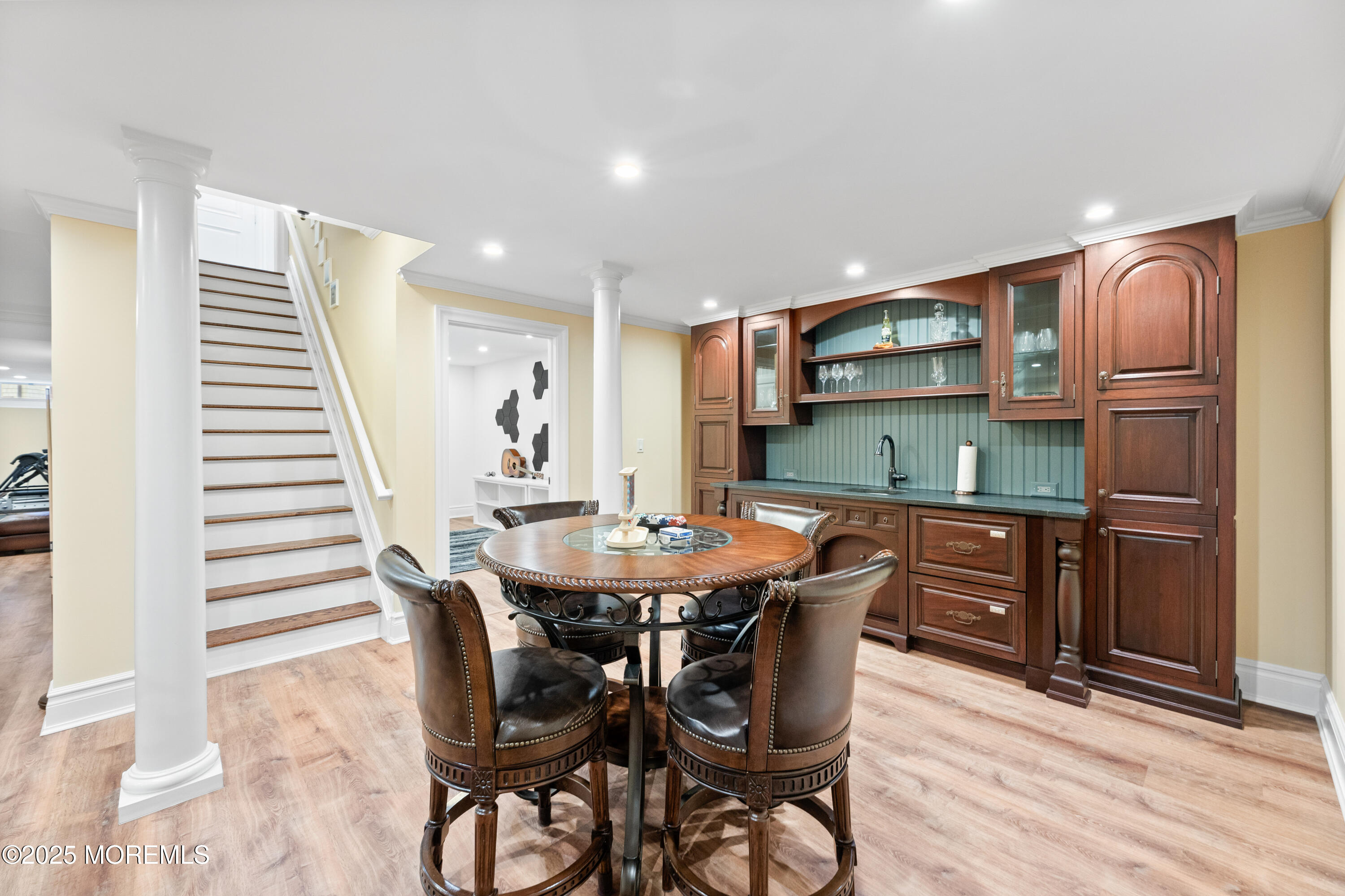 13 Indian Path Millstone Township, NJ 08535 - Photo 48 of 67 a view of a dining room with furniture and wooden floor