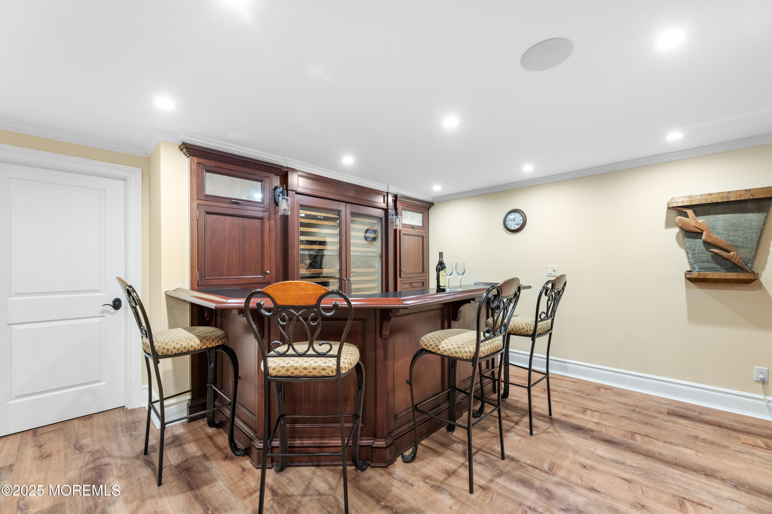 13 Indian Path Millstone Township, NJ 08535 - Photo 49 of 67 a view of a dining room with furniture and wooden floor