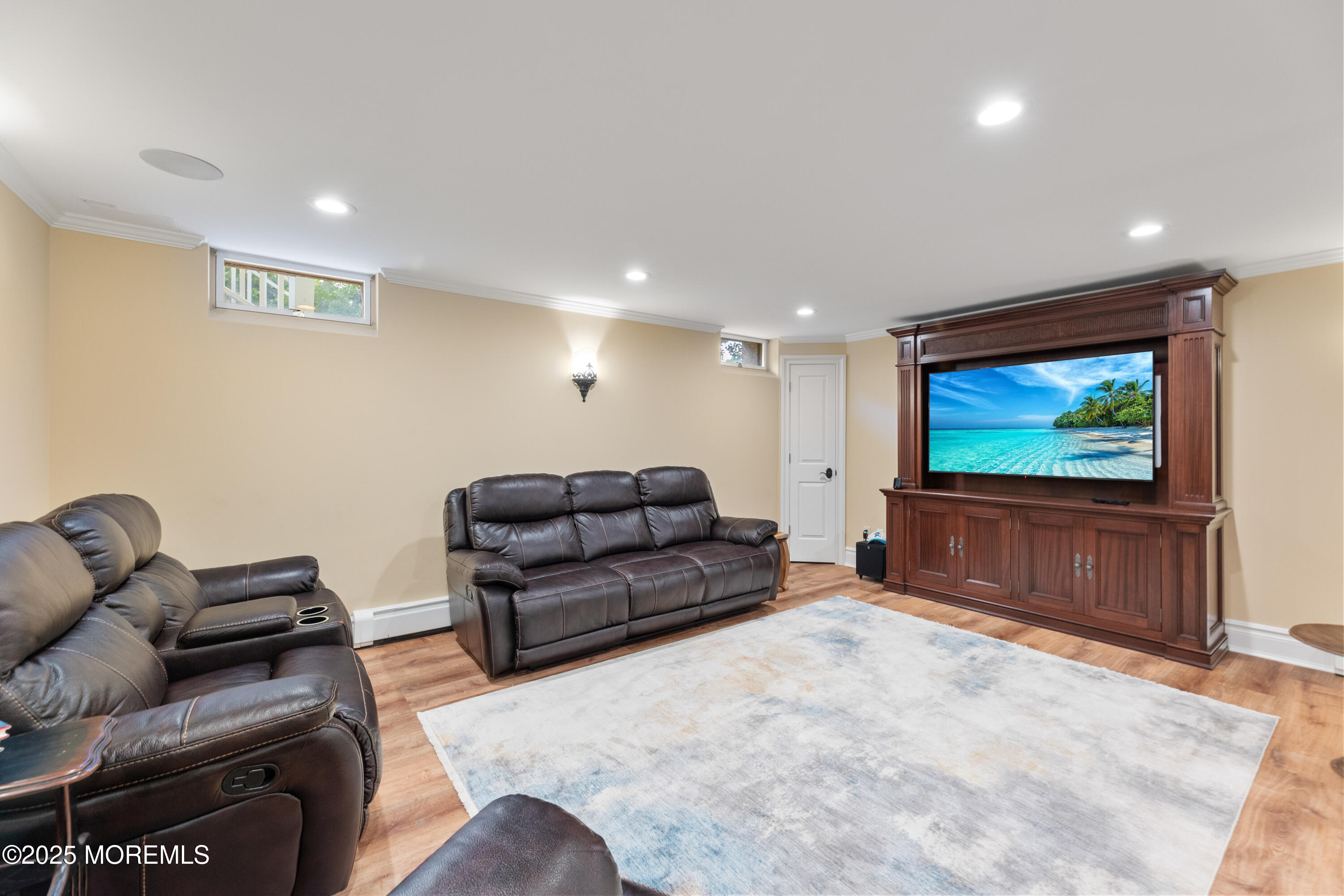 13 Indian Path Millstone Township, NJ 08535 - Photo 54 of 67 a living room with furniture and a flat screen tv