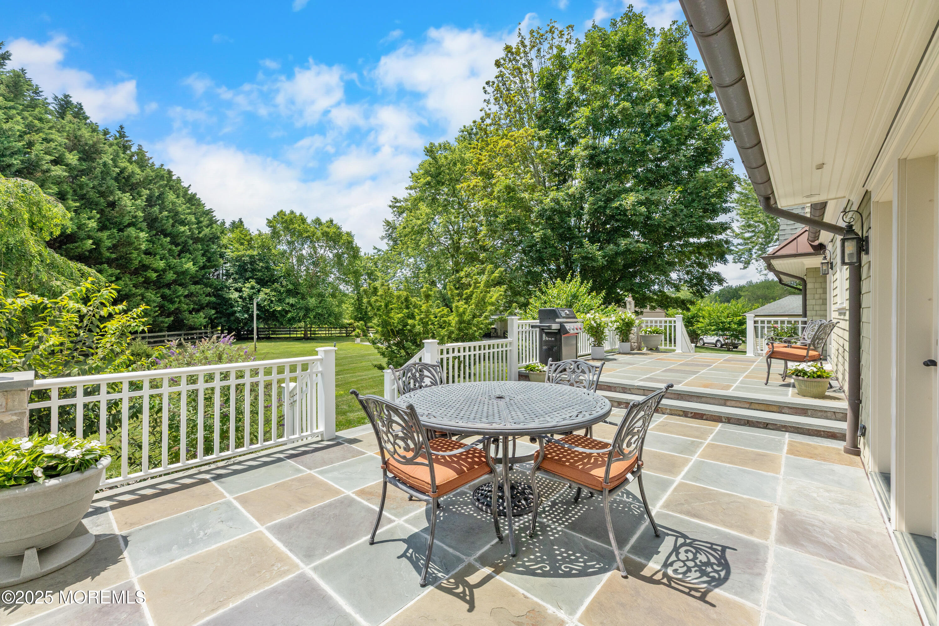 13 Indian Path Millstone Township, NJ 08535 - Photo 58 of 67 a view of a patio with a table and chairs
