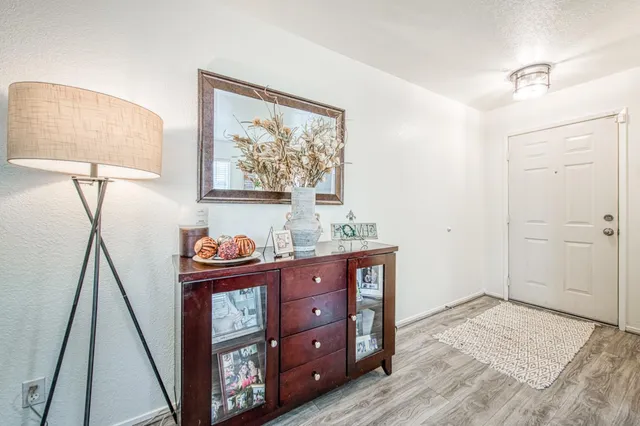 a view of a hallway with front door