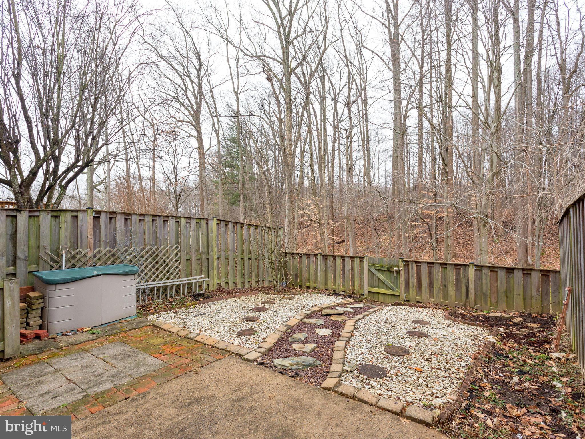 5523 Miles Court Springfield, VA 22151 - Photo 21 of 23 Custom Stone Path Leads Right to Woodline