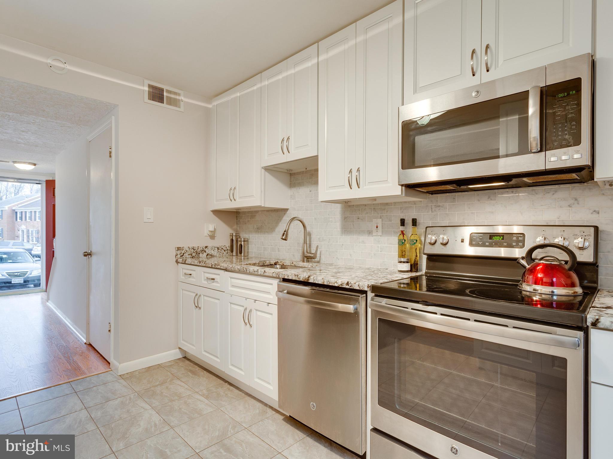 5523 Miles Court Springfield, VA 22151 - Photo 5 of 23 All White Luxury Kitchen w/ Updated Appliances