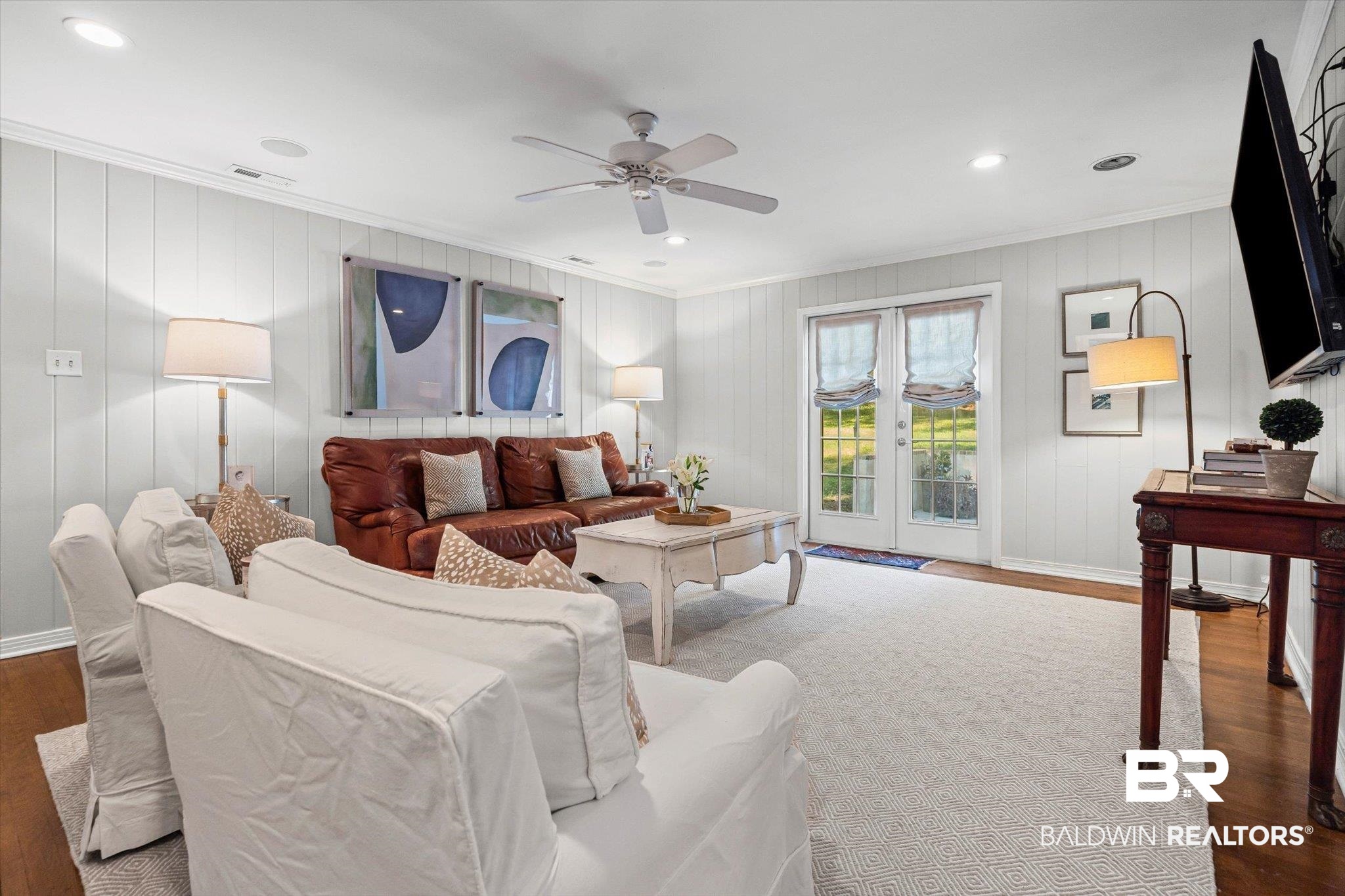 313 Brawood Drive Mobile, AL 36608 - Photo 10 of 32 Living area featuring wood finished floors, ornamental molding, french doors, recessed lighting, and a ceiling fan