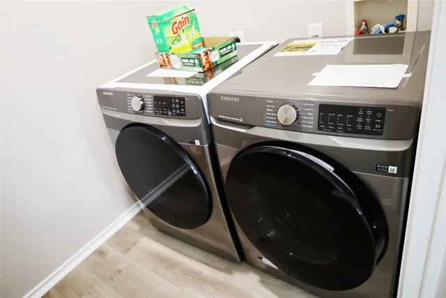 a utility room with dryer and washer