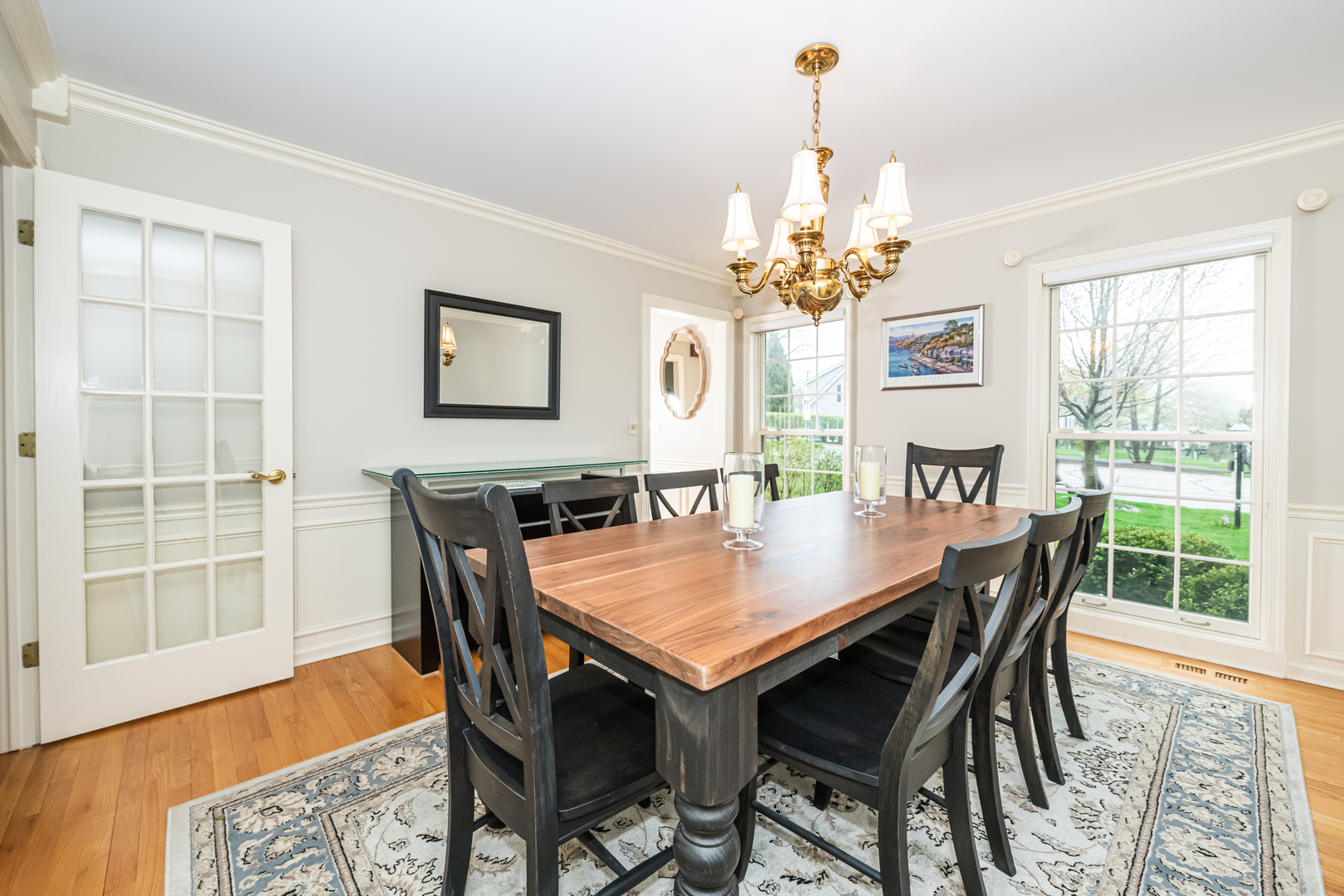 117 Whitney Drive Barrington, IL 60010 - Photo 16 of 37 a view of a dining room with furniture window and wooden floor