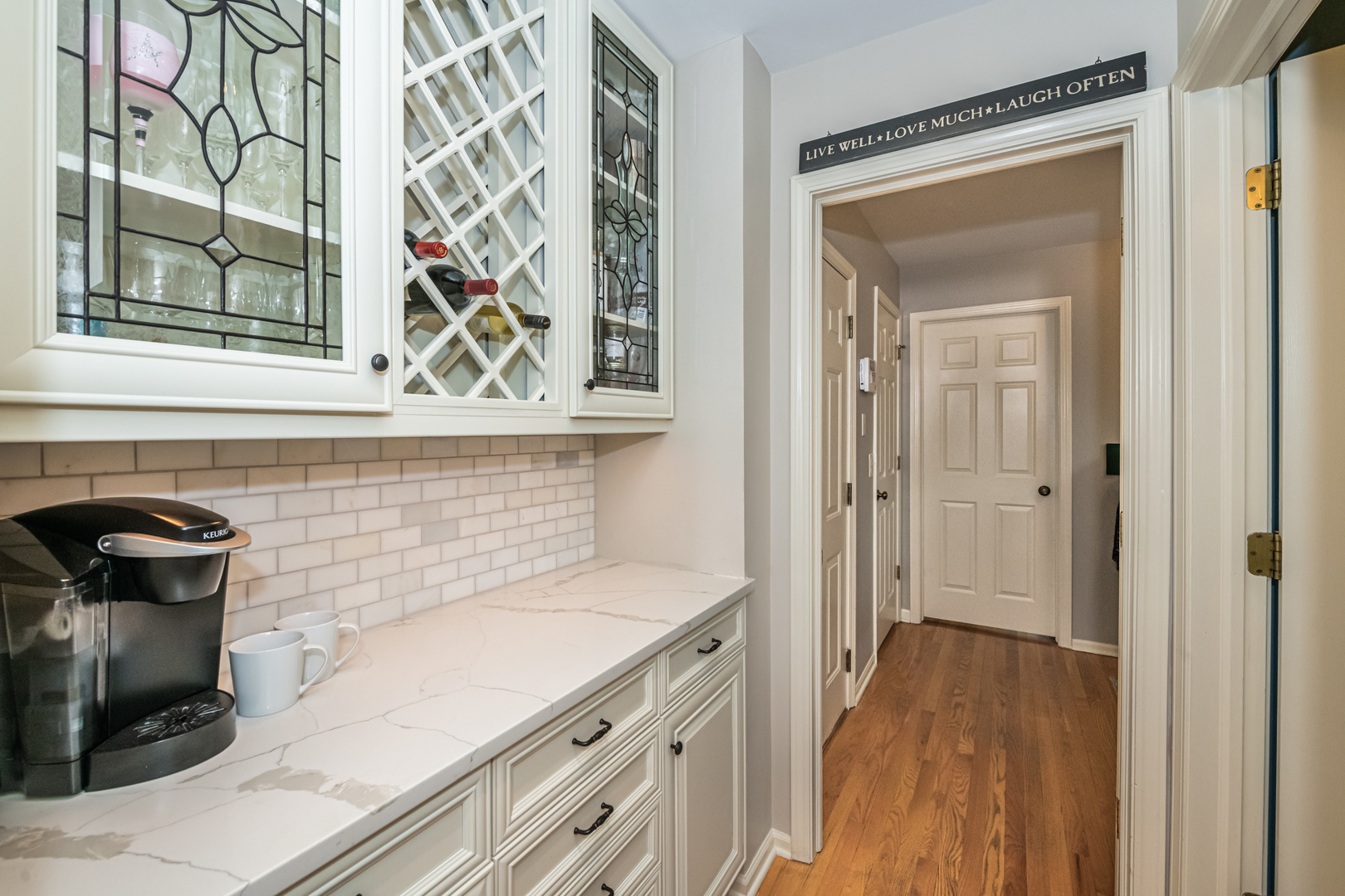 117 Whitney Drive Barrington, IL 60010 - Photo 17 of 37 a kitchen with a sink and cabinets