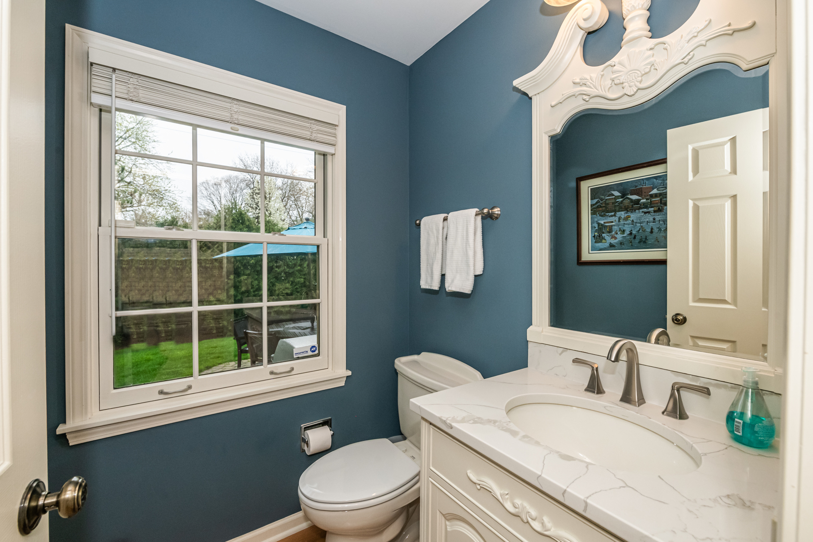 117 Whitney Drive Barrington, IL 60010 - Photo 20 of 37 a bathroom with a granite countertop sink mirror vanity and a toilet